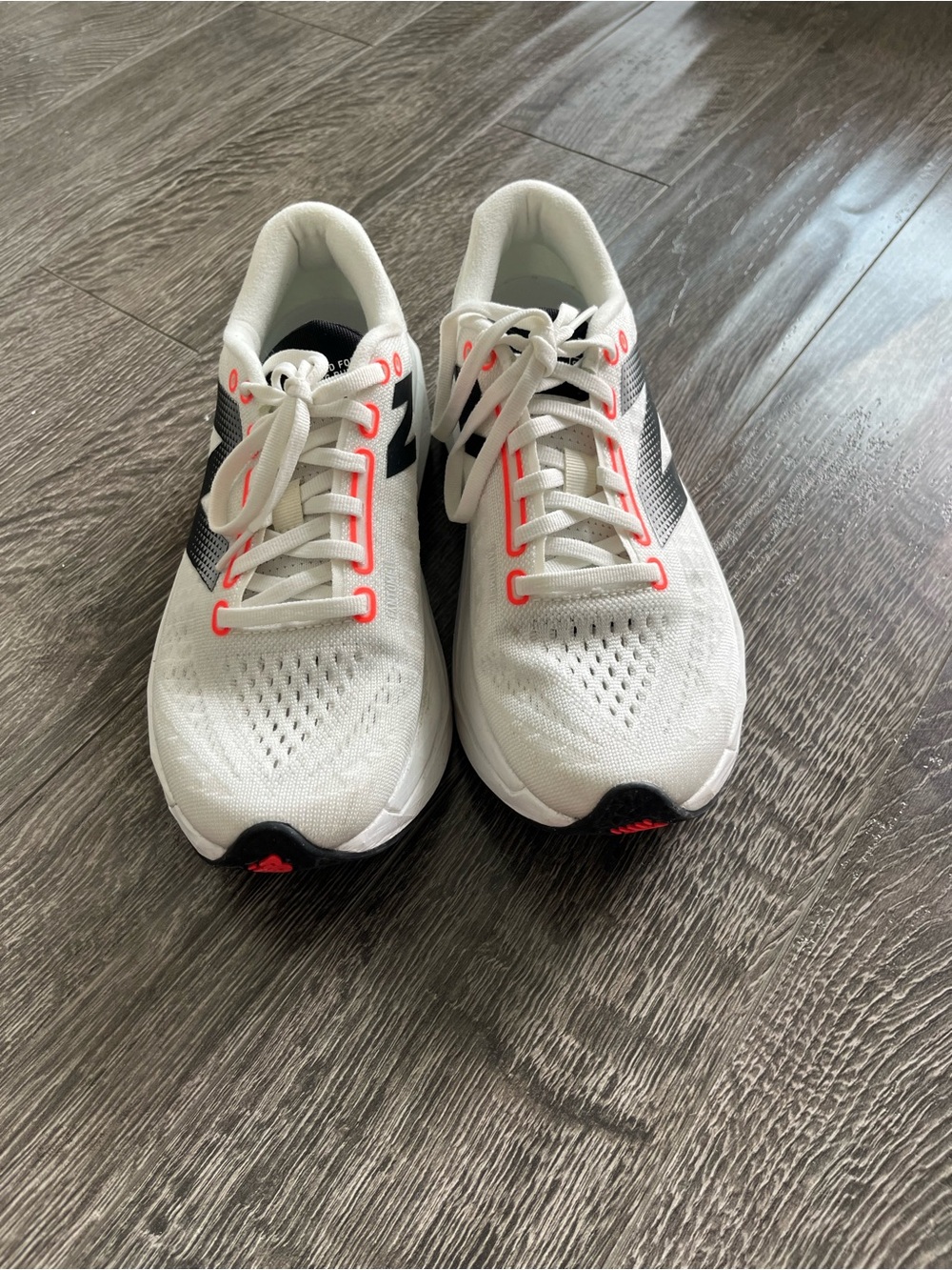 New Balance White Sneakers with Black and Coral Highlights